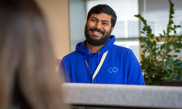 Booleans team member IAM specialist Aniket Bhattacharya during a meeting.