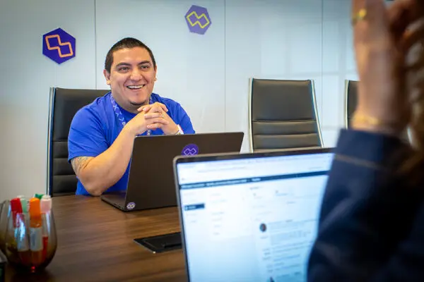 Principal Consultant of Booleans, Maurice Omar in a meeting
